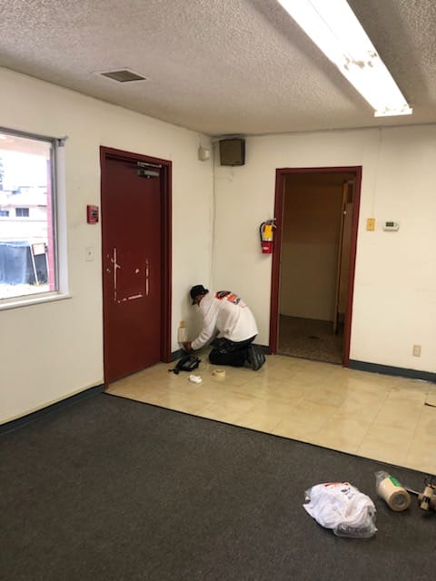 We gave a makeover to this Lutheran Church school. We redid the bathroom and flooring as well as painted the cabinets and doors.