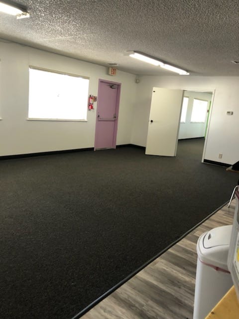 We gave a makeover to this Lutheran Church school. We redid the bathroom and flooring as well as painted the cabinets and doors.