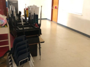 We gave a makeover to this Lutheran Church school. We redid the bathroom and flooring as well as painted the cabinets and doors.