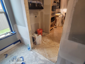 Installing New Drywall after 2' Ripped Out Due to Water Damage